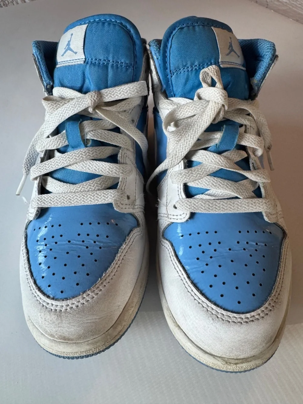 Air Jordan I Mid Youth size 3Y. Light blue and white.